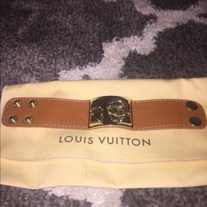 Super cute gold and leather bracelet